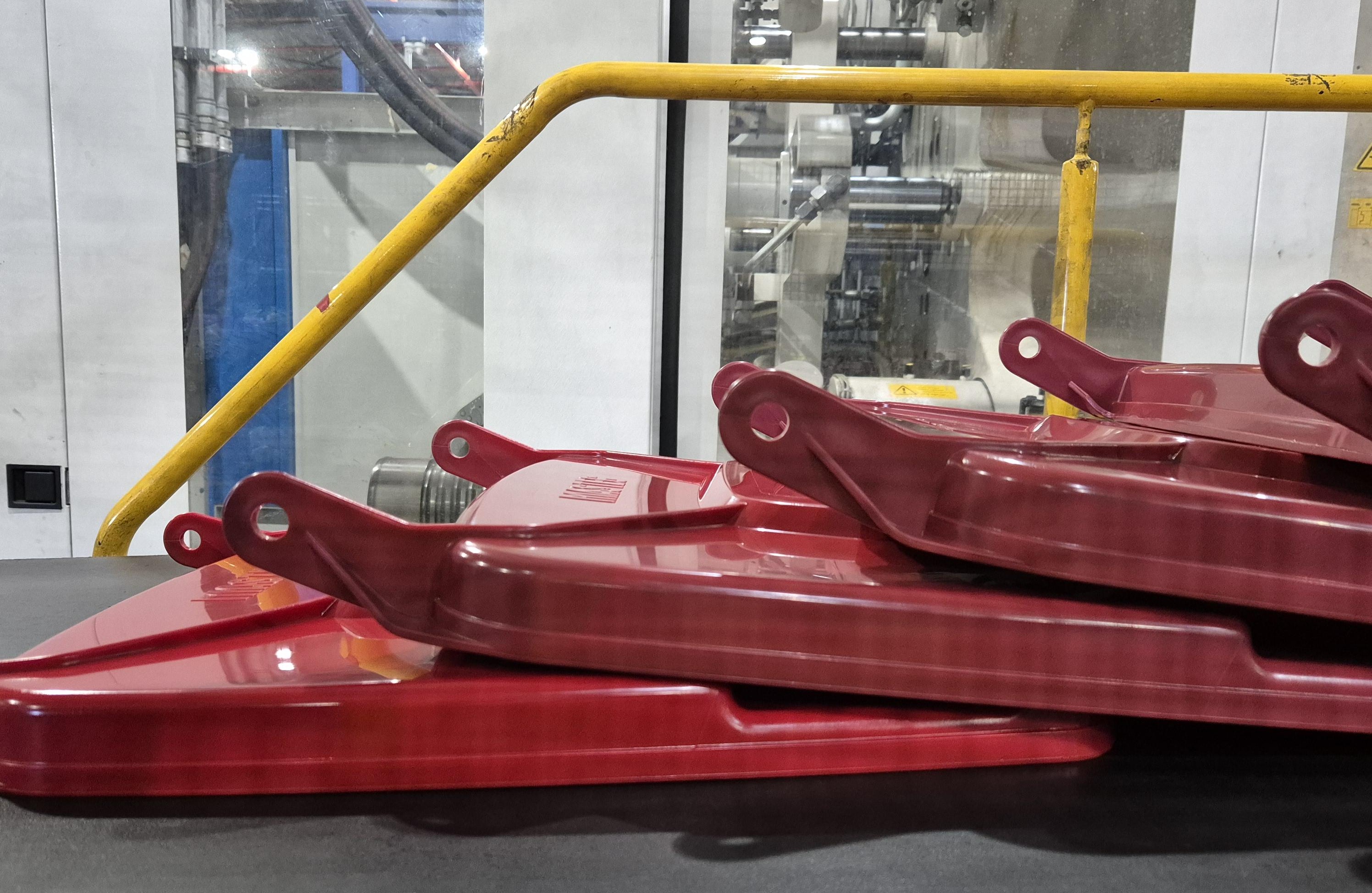 Recycled bin lids in factory production